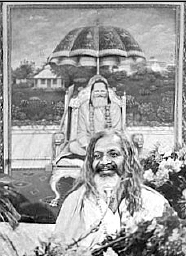 Maharishi Mahesh Yogi before Guru Dev portrait